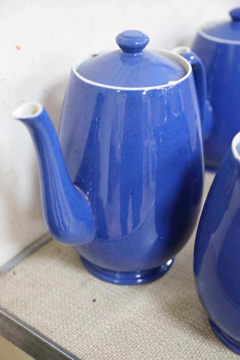 A Moorcroft powder blue part tea service